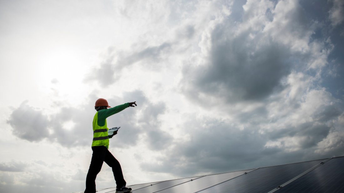 technician-engineer-checks-maintenance-solar-cell-panels